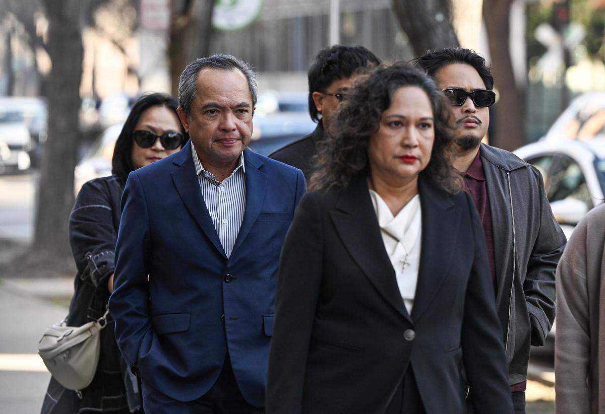 Former Capital Public Radio general manager Jun Reina arrives at the Sacramento County Main Jail before his arraignment on Monday, Feb. 2, 2026, on felony counts of embezzlement, grand theft and forgery.