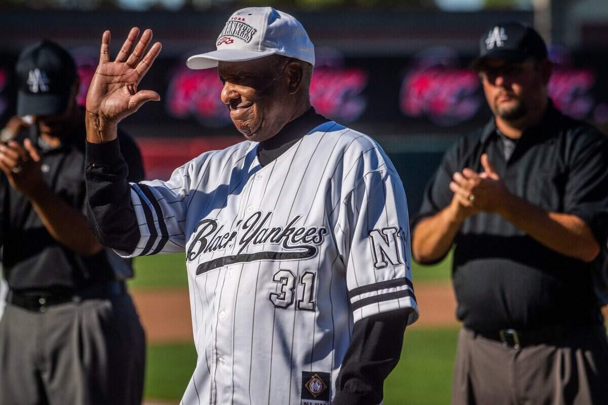 Donald Porter, a Sacramento resident who played for the Black Yankees in the Negro League, is honored during a game celebrating the league’s 100th anniversary at Sutter Health Park in 2021. Porter, who threw the first pitch, was nicknamed Rook - short for rookie - because he entered the league as a teenager.