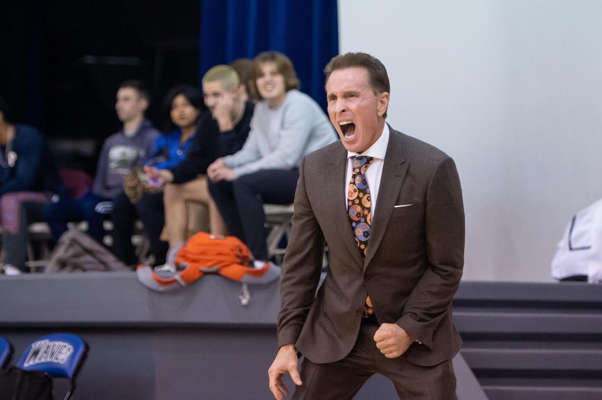 Waldorf Waves coach Dean Stark yells for the team to grab the rebound in December.
