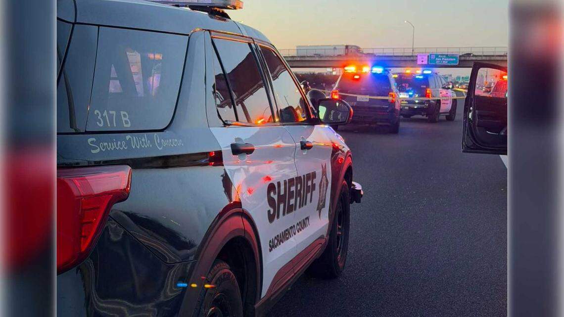 Sacramento County sheriff’s deputies are seen on Interstate 5 near the Arena Boulevard overcrossing in Sacramento on Tuesday, April 14, 2026. Four deputies fatally shot an armed man suspected of carjacking after a pursuit that began in Citrus Heights.