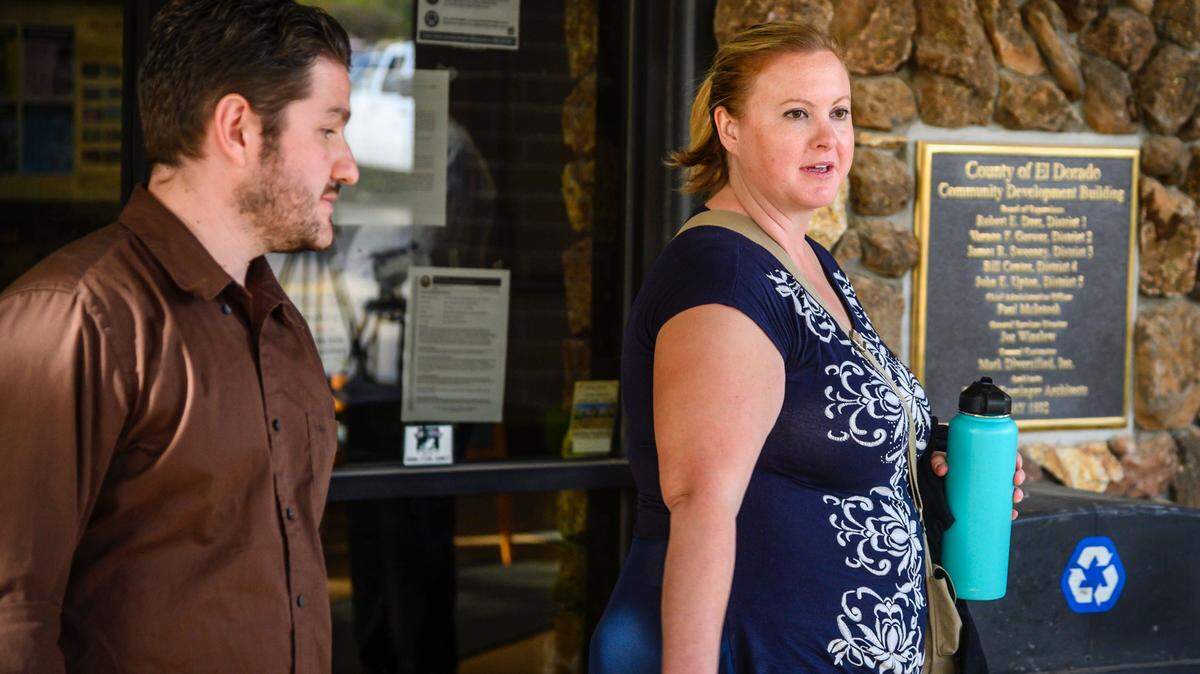 Kimberly Wohlwend, right, leaves the El Dorado Superior Court after her arraignment on charges of involuntary manslaughter in 2019 in Placerville. Wohlwend is the teacher accused of being among those who restrained 13-year-old Max Benson.
