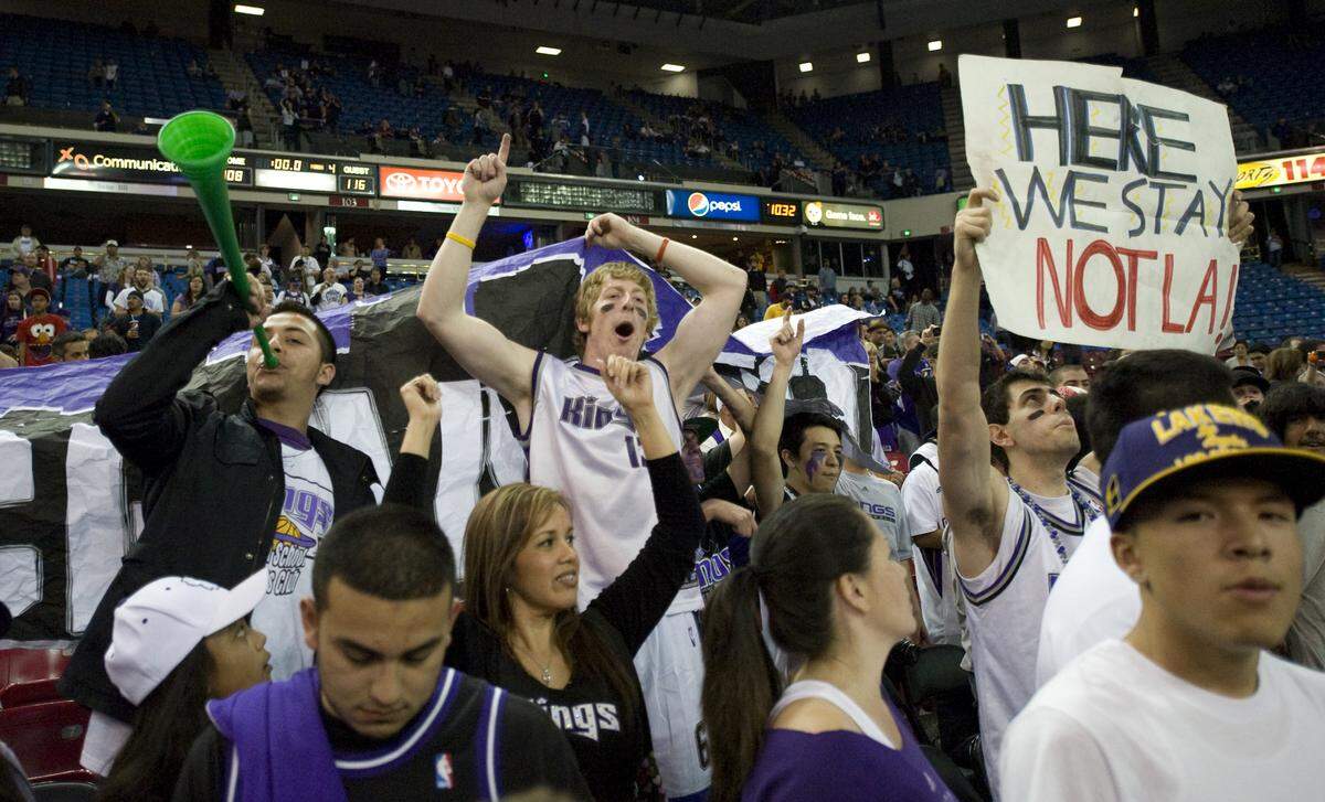 Sacramento KIngs fans cheer on their team during the final game of the 2011 season as the team’s future in the city seems in doubt. 
