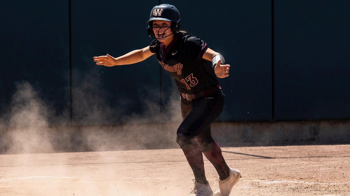 The Whitney Wildcats’ Alyssa Flindt celebrates her run during the CIF Sac-Joaquin Section Division II championship softball game Saturday against the Rocklin Thunder at Sacramento State.