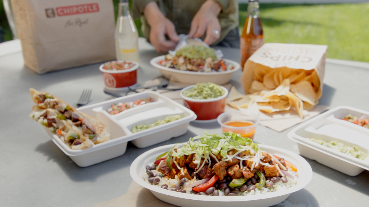 An array of menu items available at Chipotle Mexican Grill, including bowls, a quesadilla and tortilla chips.
