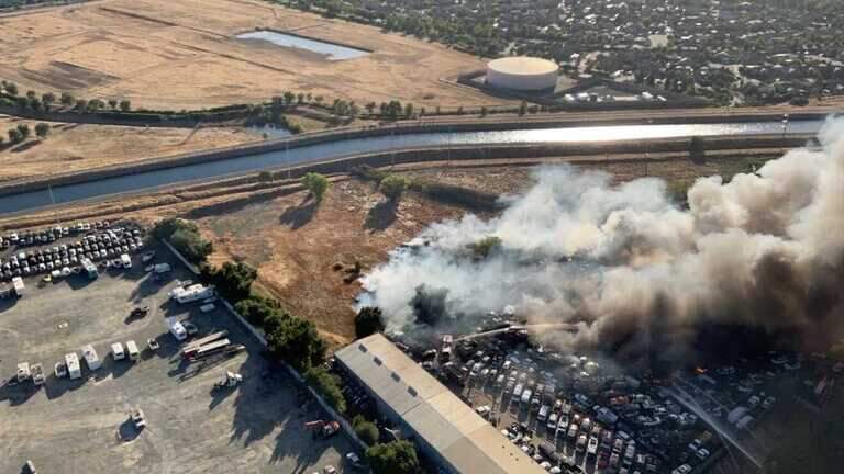 Firefighters stop Rancho Cordova wrecking yard fire after up to 100 vehicles burn