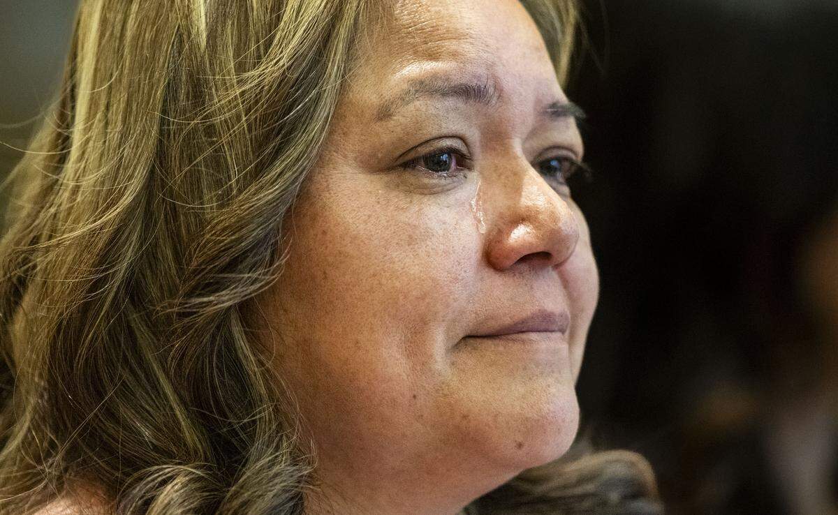 Maria de Jesus Estrada sheds a tear as she recalls being separated from her daughter, Damaris Bello, as she speaks at a news conference with Bello at Sacramento City Hall on Tuesday.