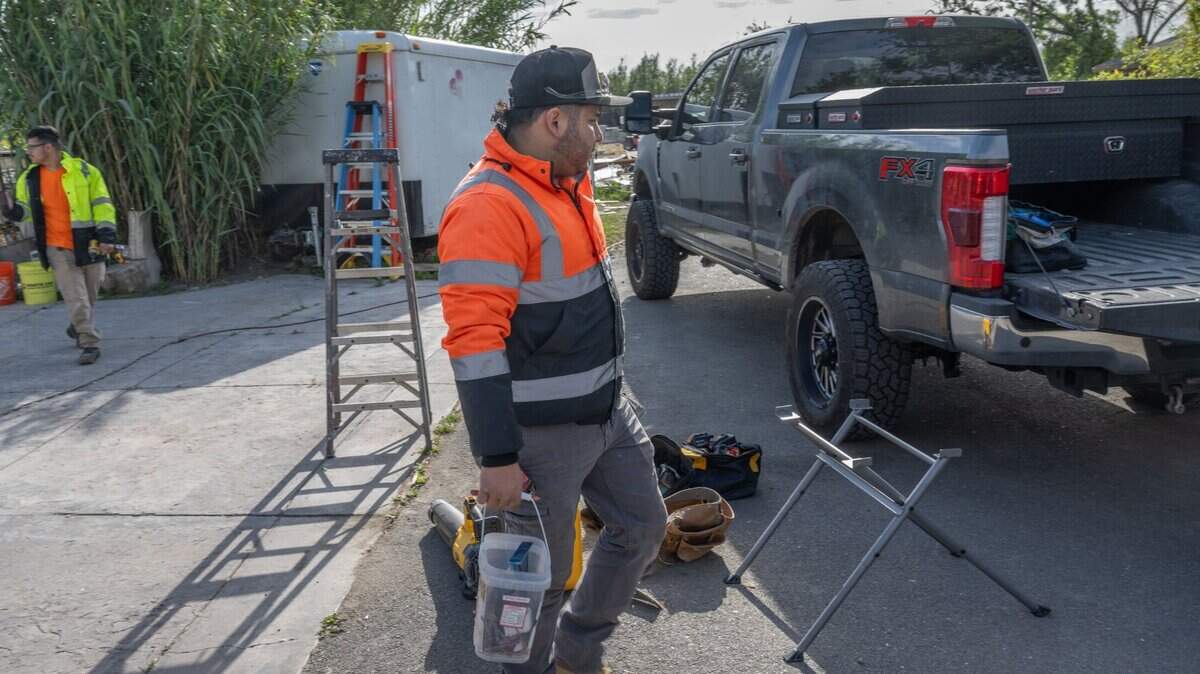 Daniel Mejia of Stockton prepares to go to work in April. Mejia said that he hopes to recover more than $20,000 he said that is owed to him from a Sacramento company that used his services and that of other friends.