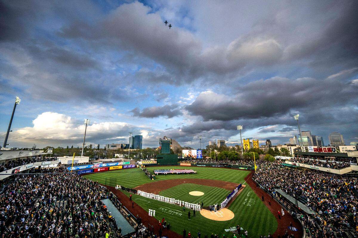 Two T-38 Talon jets from Beale Air Force Base fly over the first Major League Baseball game at Sutter Health Park in West Sacramento on March 31 during the national anthem.