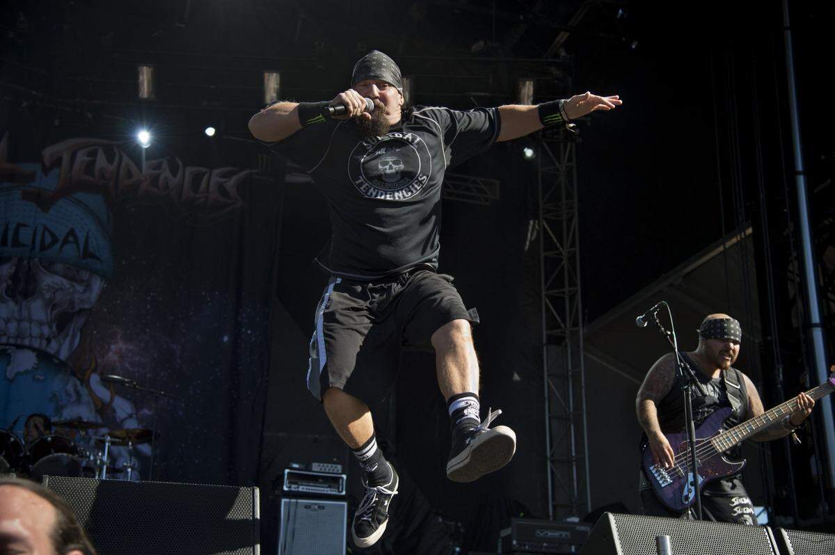 Suicidal Tendencies singer Mike Muir leaps on stage in 2017 at the Aftershock festival at Discovery Park. They will be preforming on Friday.