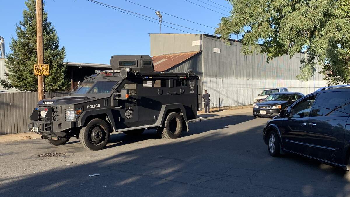 Sacramento police, SWAT team and negotiators leave the 7000 block of 17th Avenue after a standoff ended with a man’s arrest.