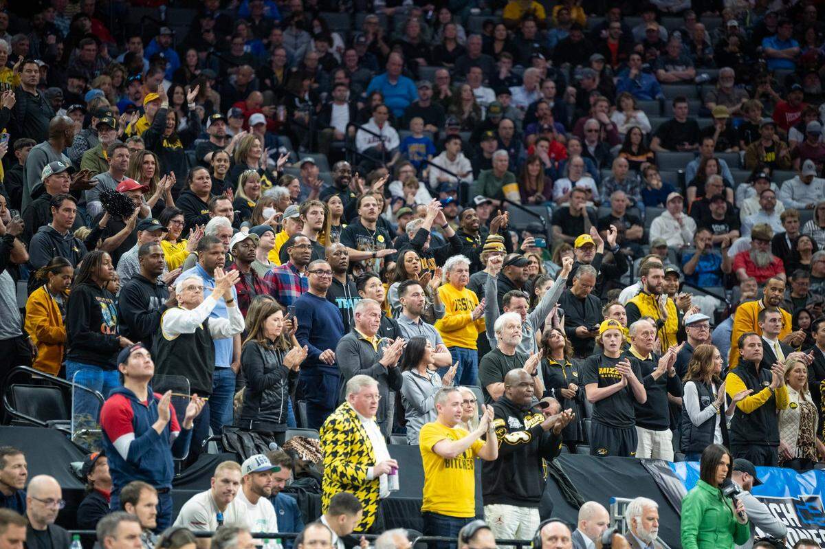 Missouri Tigers fans cheer on their team in the final minutes of the first-round game against the Utah State Aggies at the NCAA Tournament at Golden 1 Center in Sacramento on Thursday.