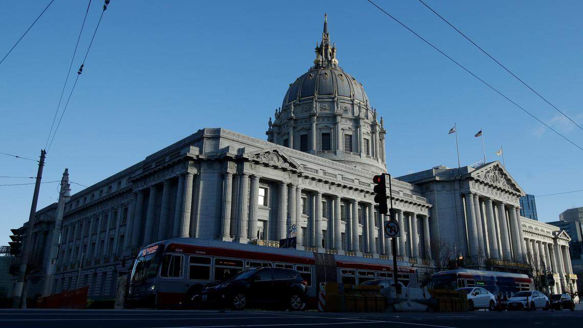 The City Hall building is shown in San Francisco, Tuesday, Jan. 7, 2020. Just one block away, rats run wild at a popular park.
