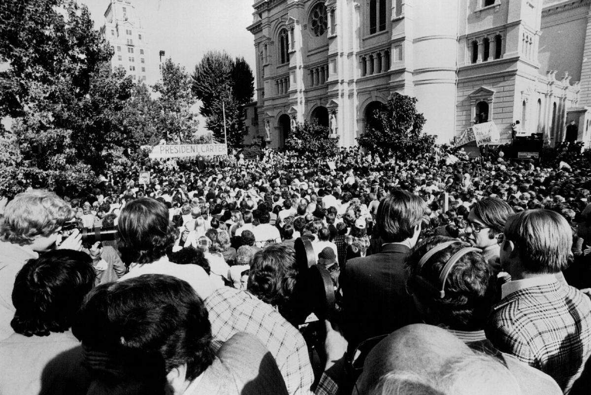 A large crowd awaits President Jimmy Carter outside the Cathedral of the Blessed Sacrament in downtown Sacramento during his visit in November 1978.