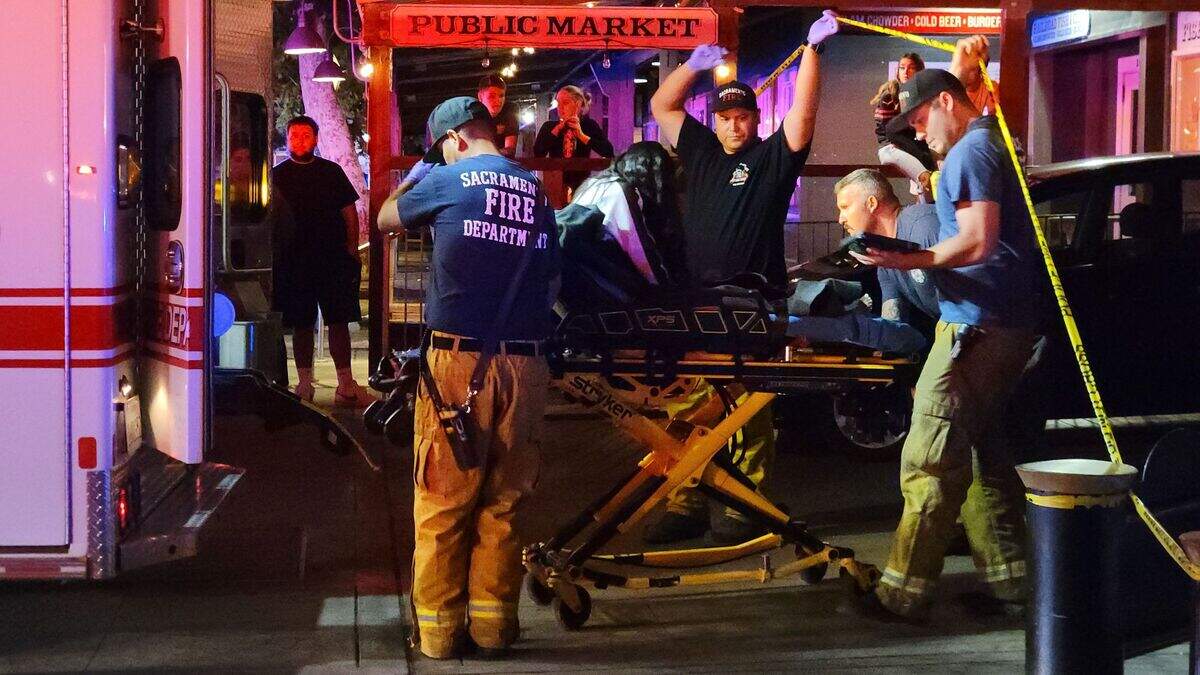 Sacramento Fire Department personnel respond to a shooting Friday, July 16, 2021, in Old Sacramento that left two dead and four injured.