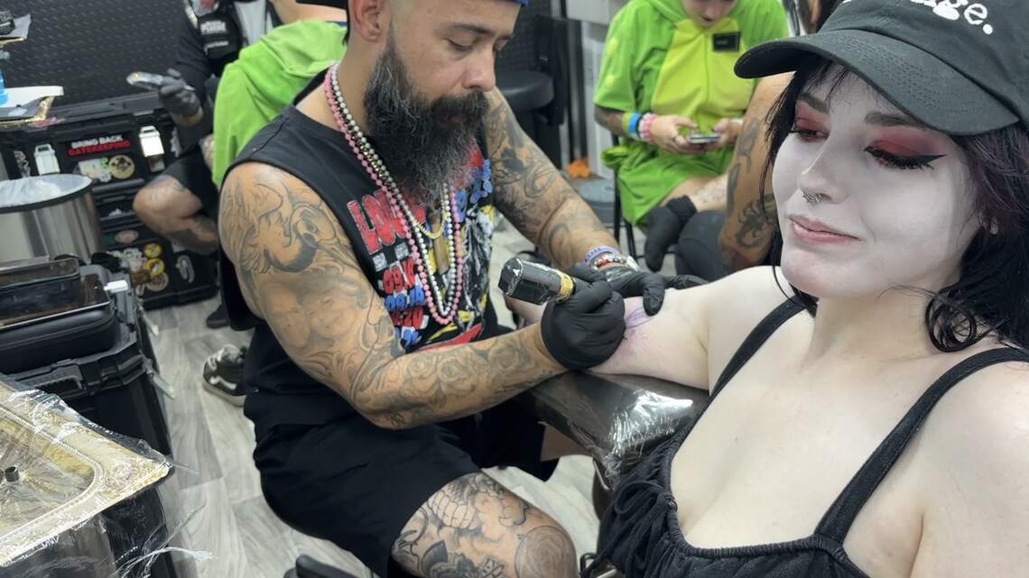 What’s the buzz at Aftershock? Mobile tattoo studio offers permanent merchandise