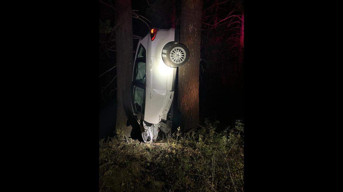 A driver on Friday Aug. 27, 2021, lost control of his car, which went off Highway 88 and wedged itself between two trees between Carson Pass and Woods Lake Road in Alpine County, California.