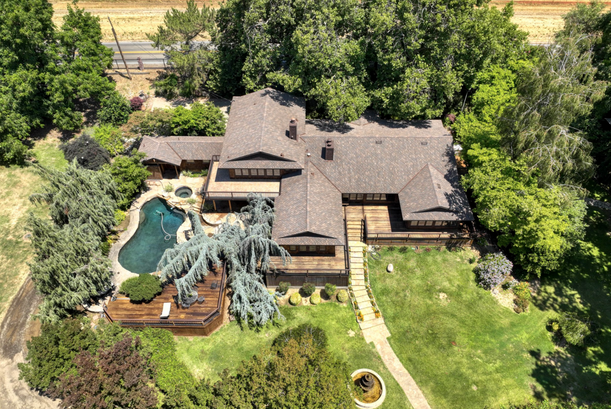 The home for sale sits on the Sacramento River off Garden Highway on 3.88 acres.