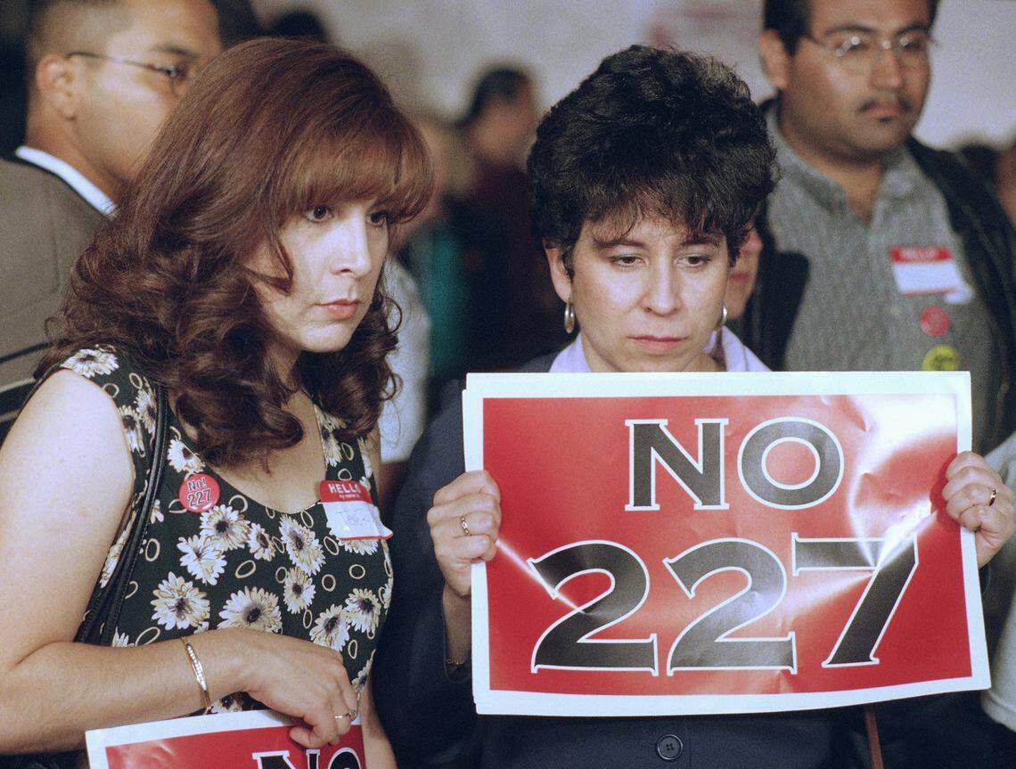 Proposition 227 opponents Dolores Sanchez, right, and Tere Rivera watch dejectedly as its passage is announced on TV in a East Los Angeles Mexican restaurant in June 1998. The proposition, the brainchild of software millionaire Ron Unz, replaced the state’s bilingual education system with a one-year English immersion program. A proposition passed in 2016 made dual-language programs easier to create.