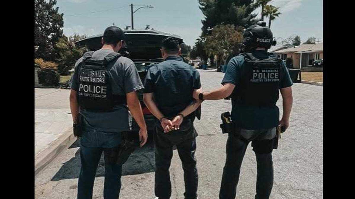 U.S. Marshals take Mario Felix, 48, formerly of Galt, into custody on Tuesday in connection with a 2021 shooting and arson. After searching for him for three years, Galt police and federal agents located Felix in San Bernardino County.