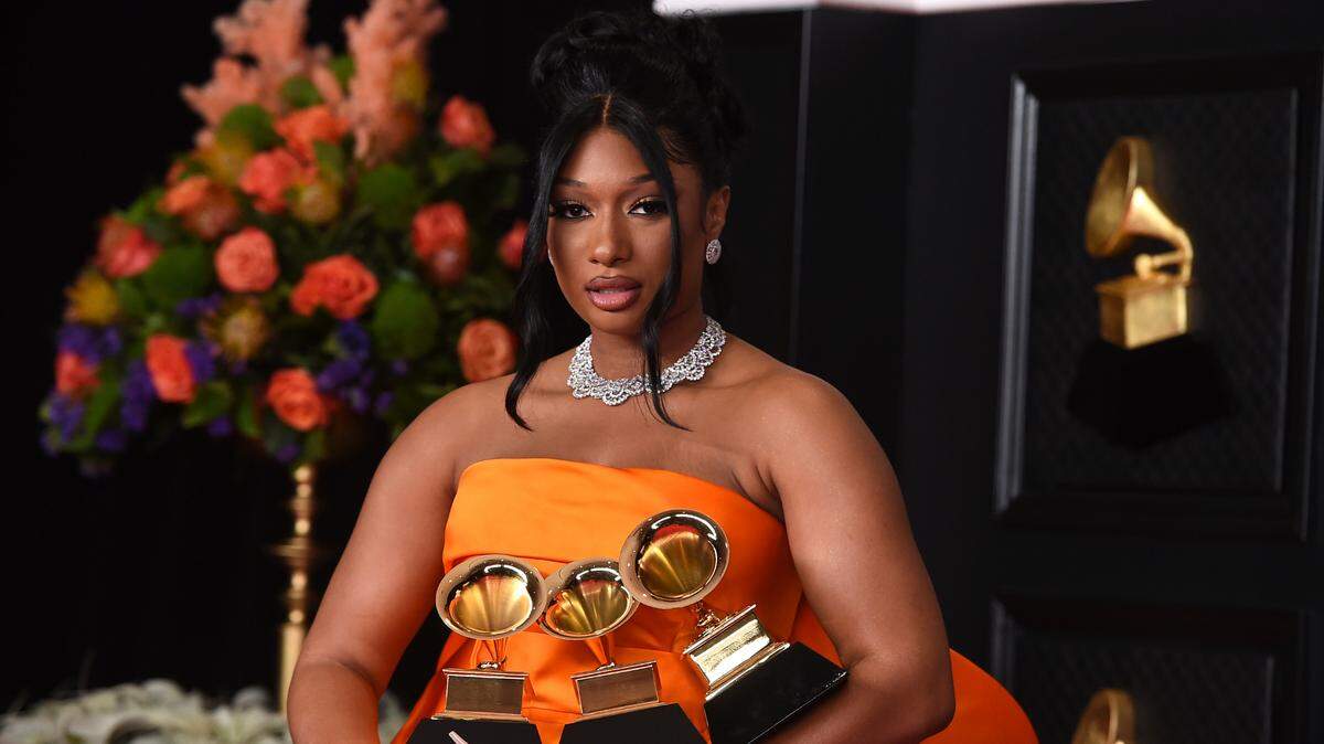 Megan Thee Stallion holds her Grammy Awards trophies March 14. She is one of three headliners at BottleRock 2021, scheduled for Sept. 3-5.