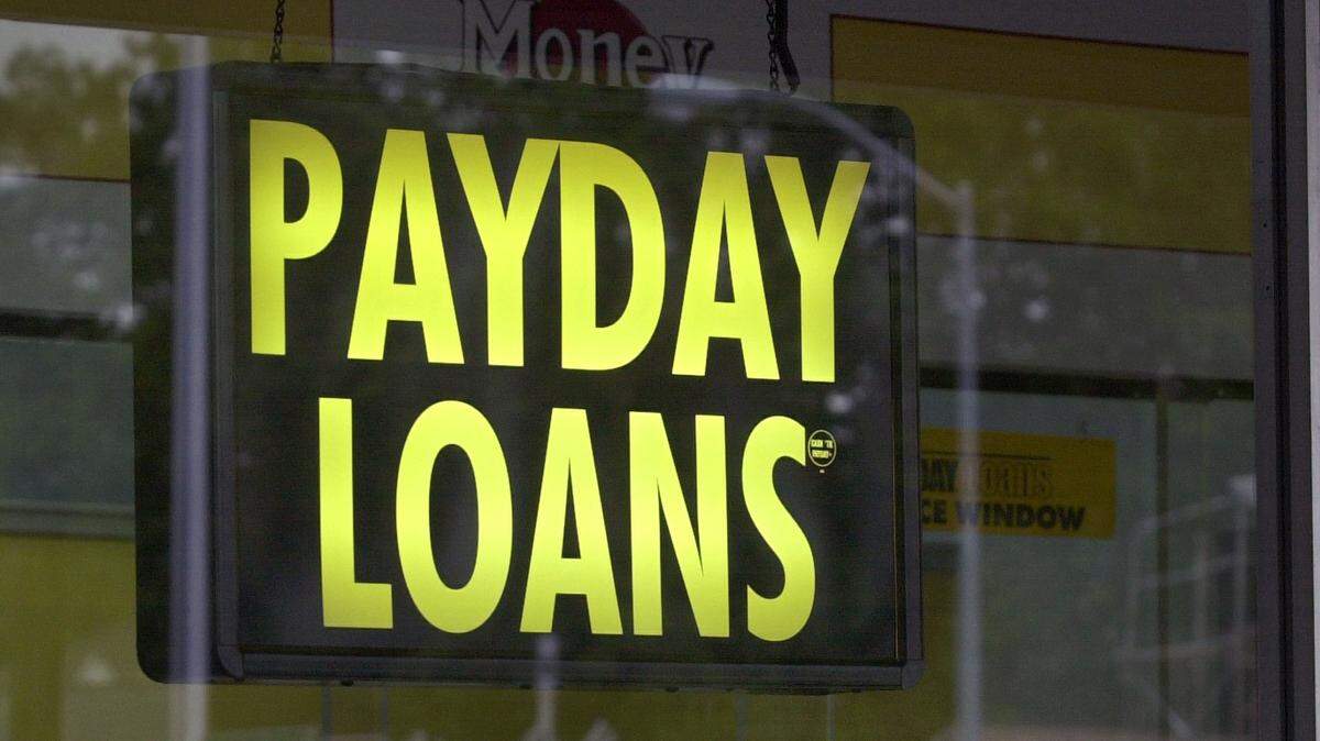 A Money Mart on Broadway and 20th Street in Sacramento on Wednesday, June 27, 2001. Sacramento residents ranked No. 3 out of 100 of the largest U.S. metropolitan areas for people paying bills on time, according to a study by Lending Tree. The Sacramento Bee / Randy Pench