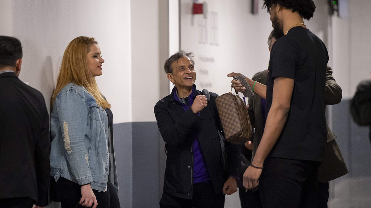 Sacramento Kings owner Vivek Ranadivé air bumps Sacramento Kings forward Marvin Bagley III (35) as he leaves the Golden 1 Center on Wednesday, March 11, 2020 in Sacramento after the NBA suspends season after Jazz’s Rudy Gobert tests positive for coronavirus.