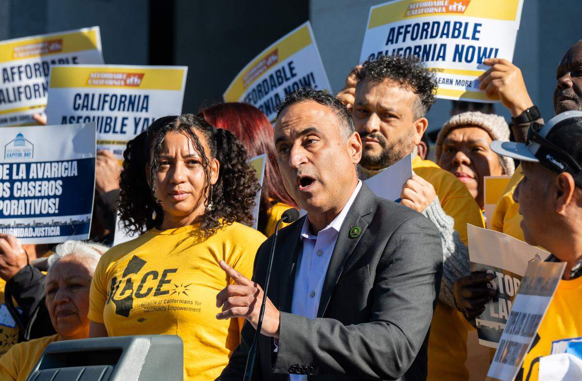 Assemblymember Ash Kalra, D-San Jose, speaks at a rally in support of Assembly Bill 1157, his bill to cut the annual rent limit increase to a maximum of 5%, at the state Capitol on Monday. He is joined at the podium by Christina Livingston, executive director of the Alliance of Californians for Community Empowerment.
