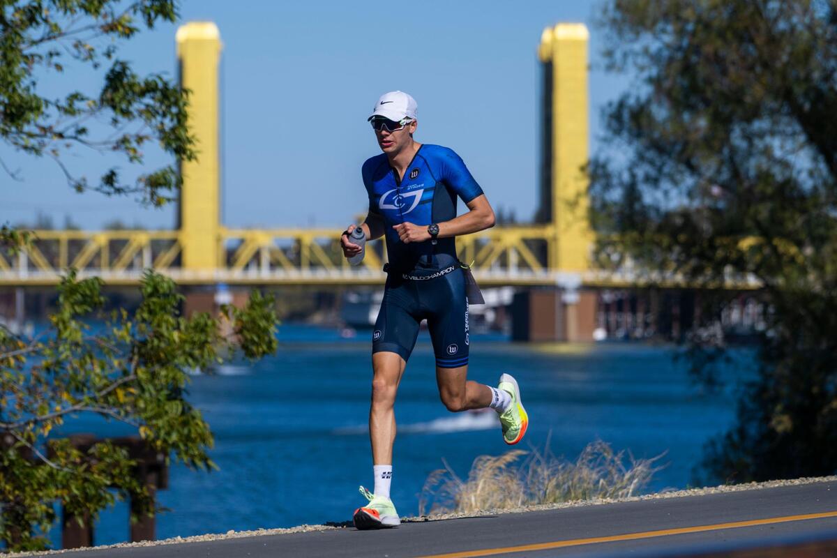 Brennen Field, of Moorestown, New Jersey, runs past the Tower Bridge during the marathon portion of the Ironman California triathlon Sunday.