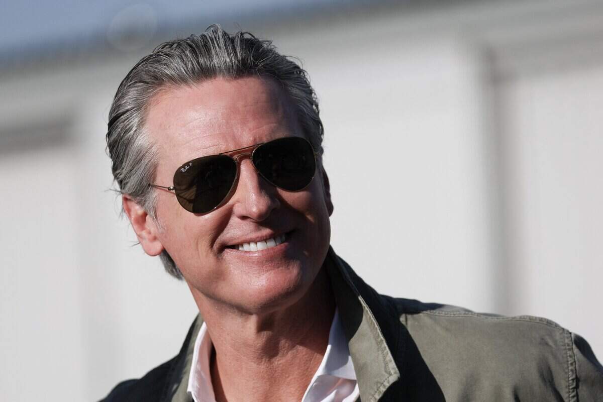 California Governor Gavin Newsom departs from a press conference with the California National Guard and California Highway Patrol (CHP) about seizures of illicit drugs including fentanyl and border security operations during a press conference at Montgomery-Gibbs Executive Airport in San Diego, California on February 2, 2026. (Photo by Patrick T. Fallon / AFP via Getty Images)