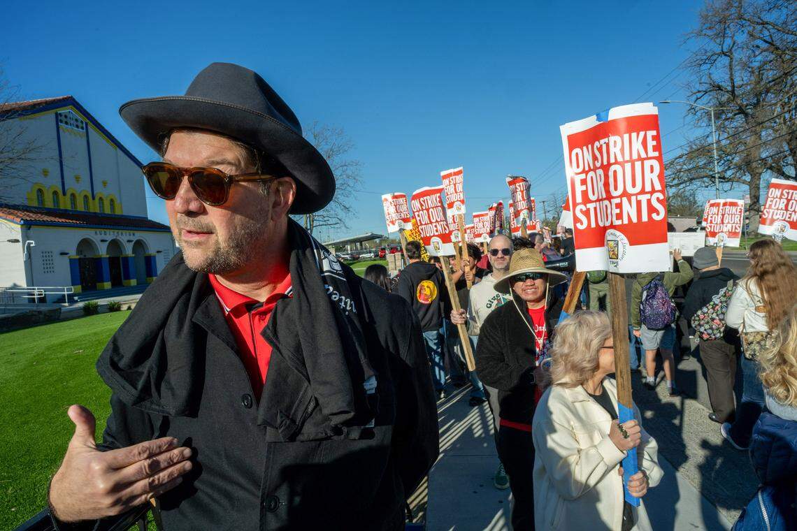 David Goldberg, president of the California Teachers Association, joins Twin Rivers Unified School District teachers during a strike in front of Grant High School in Sacramento on Thursday.