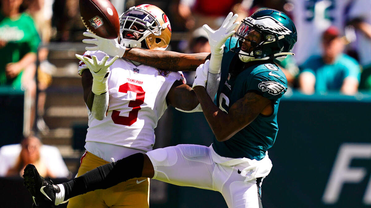 Philadelphia wide receiver DeVonta Smith misses a pass while defended by San Francisco strong safety Jaquiski Tartt on Sunday.