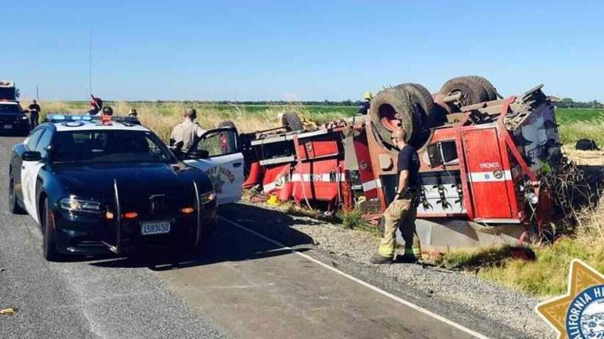 A fire truck is overturned on Aguas Frias Road in Butte County on Tuesday, July 3, 2024. Three firefighters were injured in the crash, the CHP said.