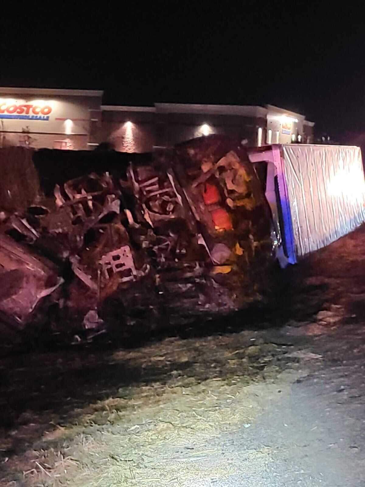 A big-rig hauling a trailer struck a metal guardrail and a dirt embankment before it caught fire early Thursday Dec. 10, 2020, along Interstate 5 in Woodland, California.