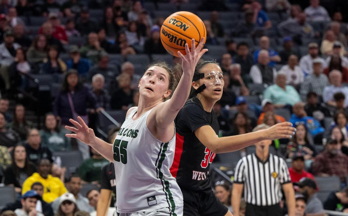 Colfax High School’s Juliette James reaches for a pass as the Falcons play the Harvard-Westlake Wolverines for the CIF Division II state championship on Saturday, March 9, 2024, at Golden 1 Center.
