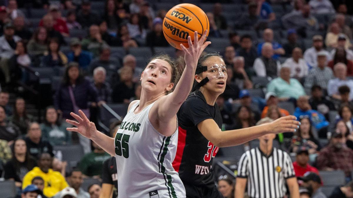 Colfax High School’s Juliette James reaches for a pass as the Falcons play the Harvard-Westlake Wolverines for the CIF Division II state championship on Saturday at Golden 1 Center.