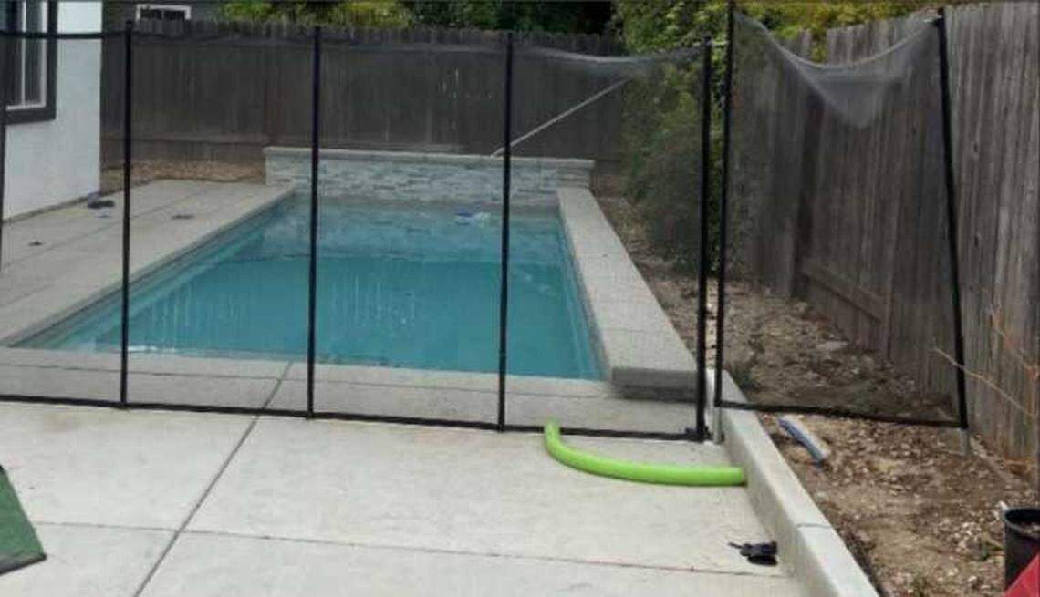 A removable mesh fence was installed around the pool at the foster home in June 2022. The parents of Sincere and Legend Strong, who drowned in the pool, sued the foster mother and Sacramento County for negligence.