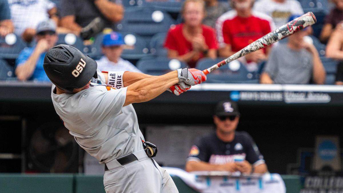 Oregon State left fielder Gavin Turley (1) hits a single in the ninth inning against Louisville in the opening round of the College World Series in Omaha, Neb., on June 17, 2025. The Athletics selected Turley with the 110th overall pick in the fourth round of the 2025 MLB draft.