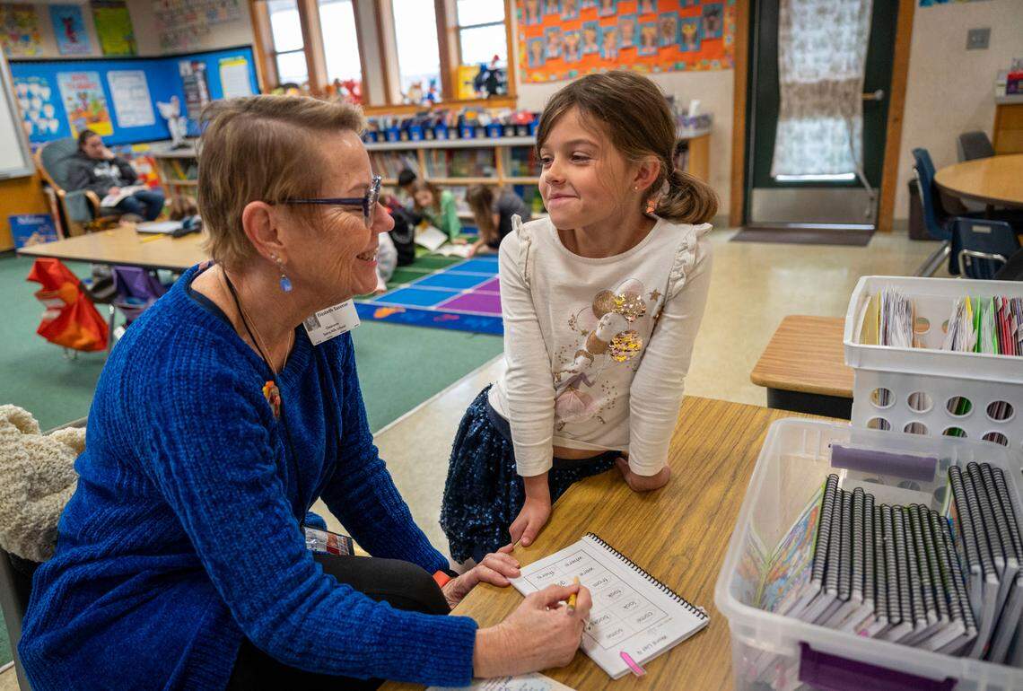 Retired teacher Lysa Sassman, a volunteer with Sight Word Busters, works one-on-one with first-grader Lexi in a classroom at Sierra Hills Elementary School in Meadow Vista earlier this month. The nonprofit is asking The Bee’s Book of Dreams for $5,000 to recruit and train more volunteers and provide more training materials.