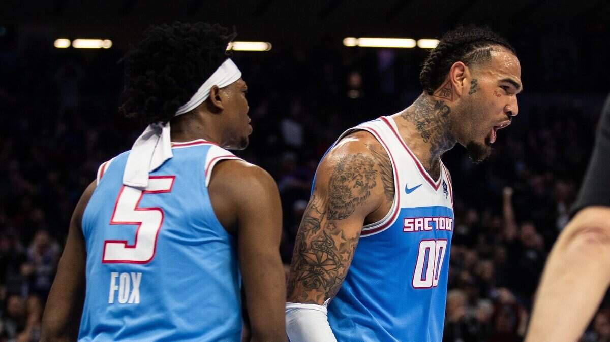 Willie Cauley-Stein, right, De’Aaron Fox and the Kings are still in the playoff hunt.