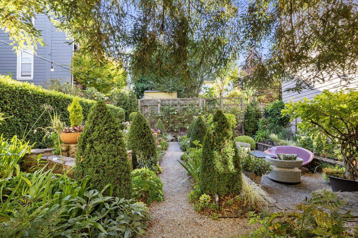 The deep garden is exquisite in this 1884 San Francsico townhouse.