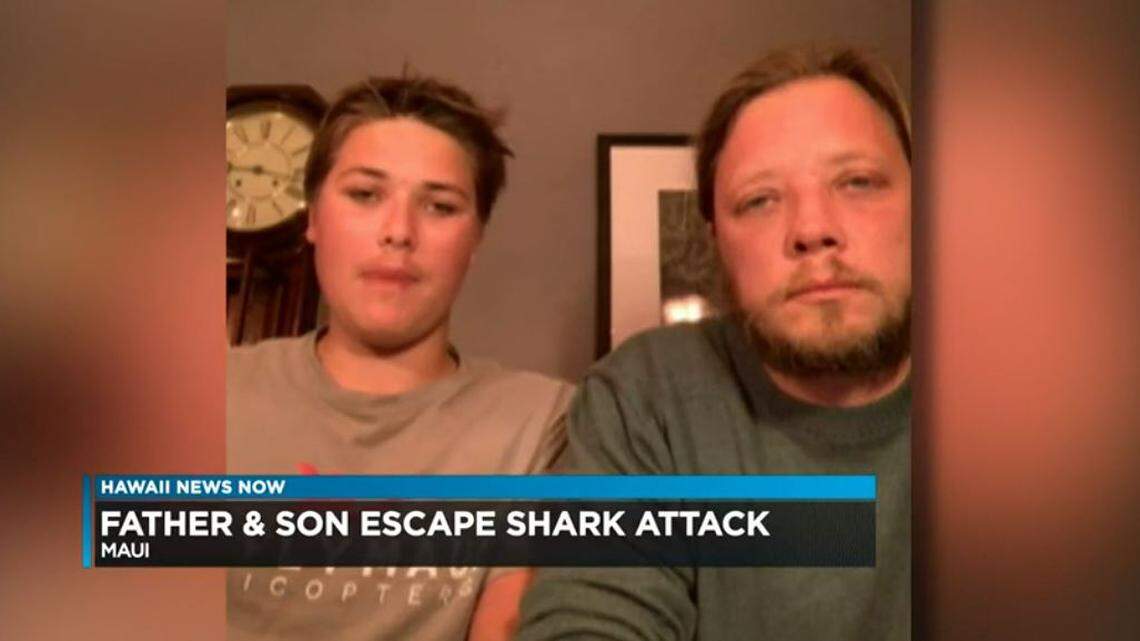 A shark tore apart a kayak off Maui in Hawaii on Tuesday, spilling 15-year-old Tristan Sullivan, left, and his father Daniel Sullivan into the ocean. Neither were hurt.