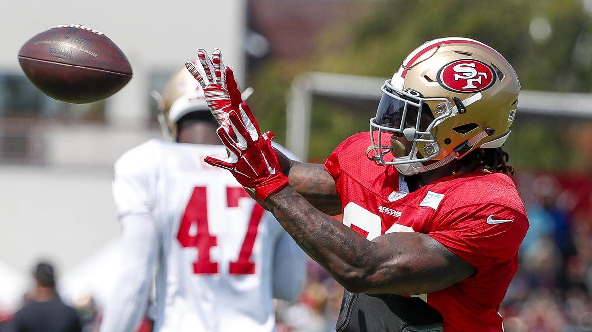 Running back Jerick McKinnon injured his right knee during the 49ers’ camp Sunday in Santa Clara. He was placed on season-ending injured reserve Monday.