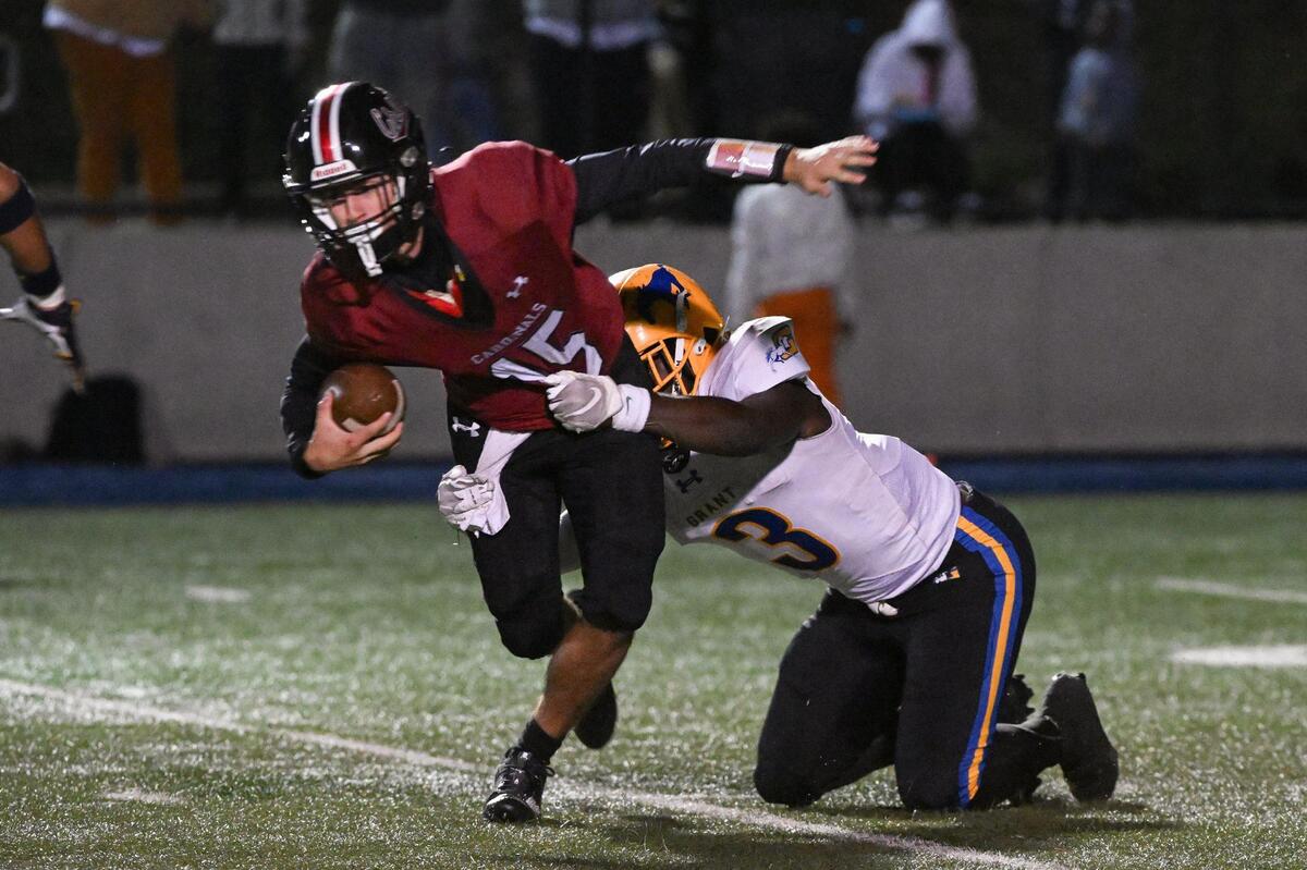 Grant Pacers strong safety Devin Green (3) sacks Laguna Creek Cardinals quarterback Mitchell Labrado (15) in the first half Friday at Cosumnes River College.