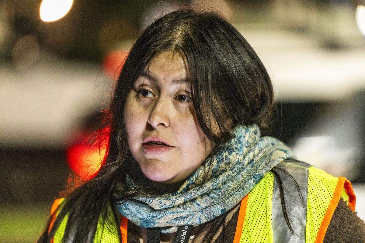 Evelynn Dominguez, with the nonprofit Community HealthWorks, participates in the Sacramento County Point-in-Time homeless count on Monday. The survey is conducted every two years to measure the number and demographics of the county's homeless population. 