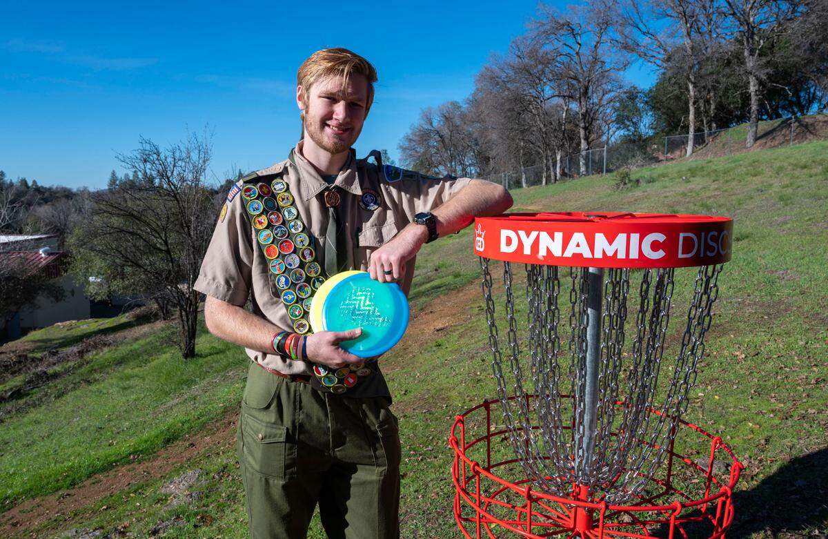 Jacob Paturel, a 17-year-old high school senior at Union Mine in El Dorado, stands earlier this month at the disc golf course at Markam Middle School in Placerville that was built as his official project as a member of Troop 460 of the Eagle Scouts.