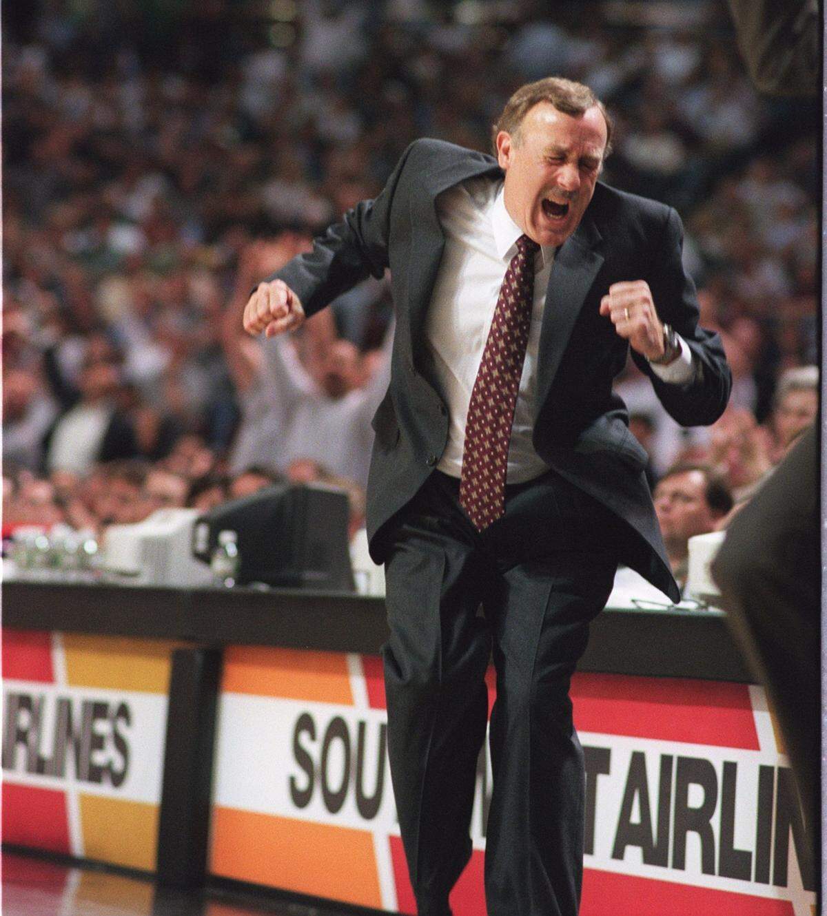 Sacramento Kings head coach Rick Adelman shows frustration from a missed shot off a steal at the end of the first half of a game against the Golden State Warriors at Arco Arena Wednesday, April 21, 1999.