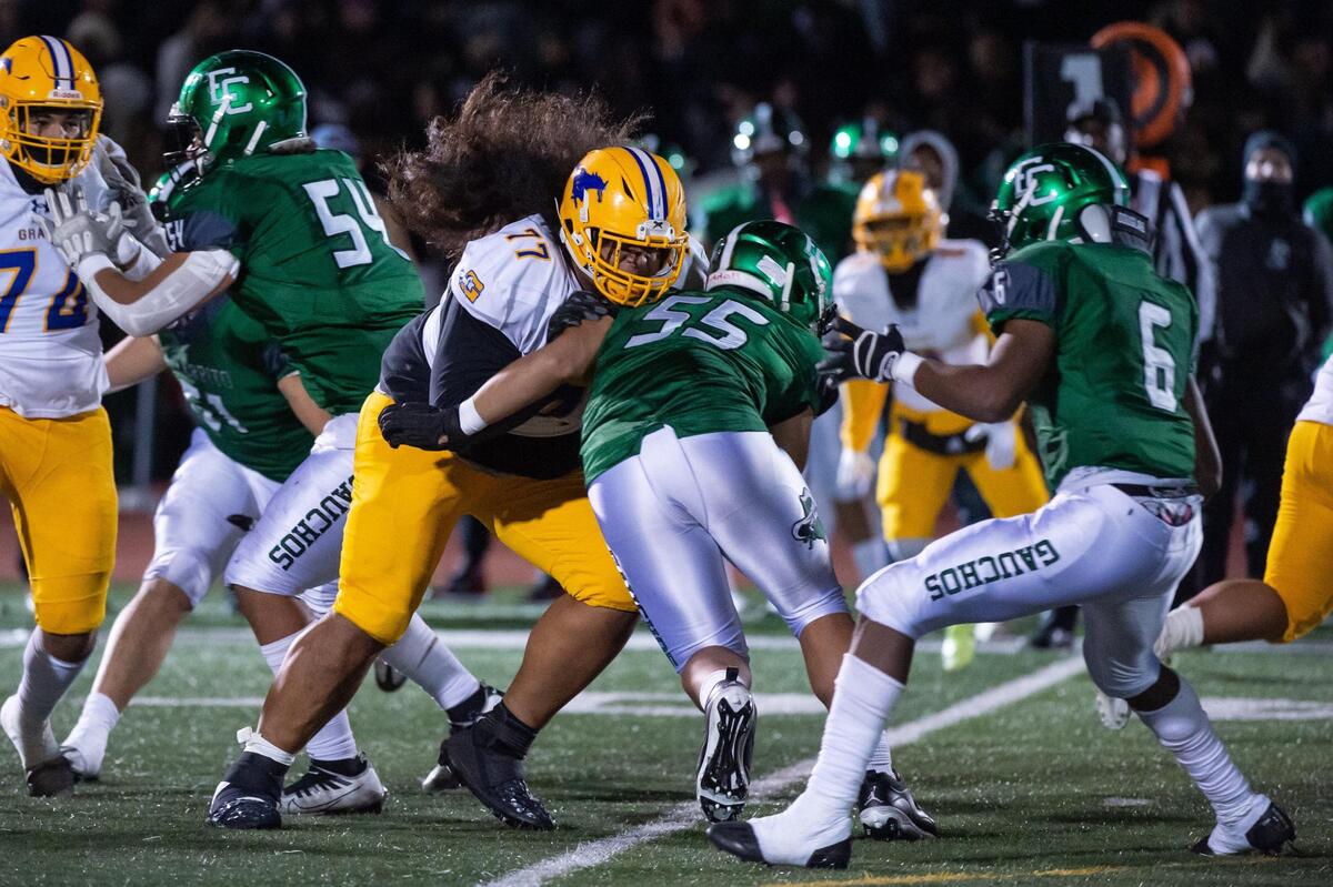 Grant Pacers Alani Noa (77) blocks El Cerrito Gauchos Sione Fanaika (55) from getting past the line during the second quarter of the CIF Division III-AA Northern California regional championship football game Friday, Dec. 2, 2022, at El Cerrito High School.