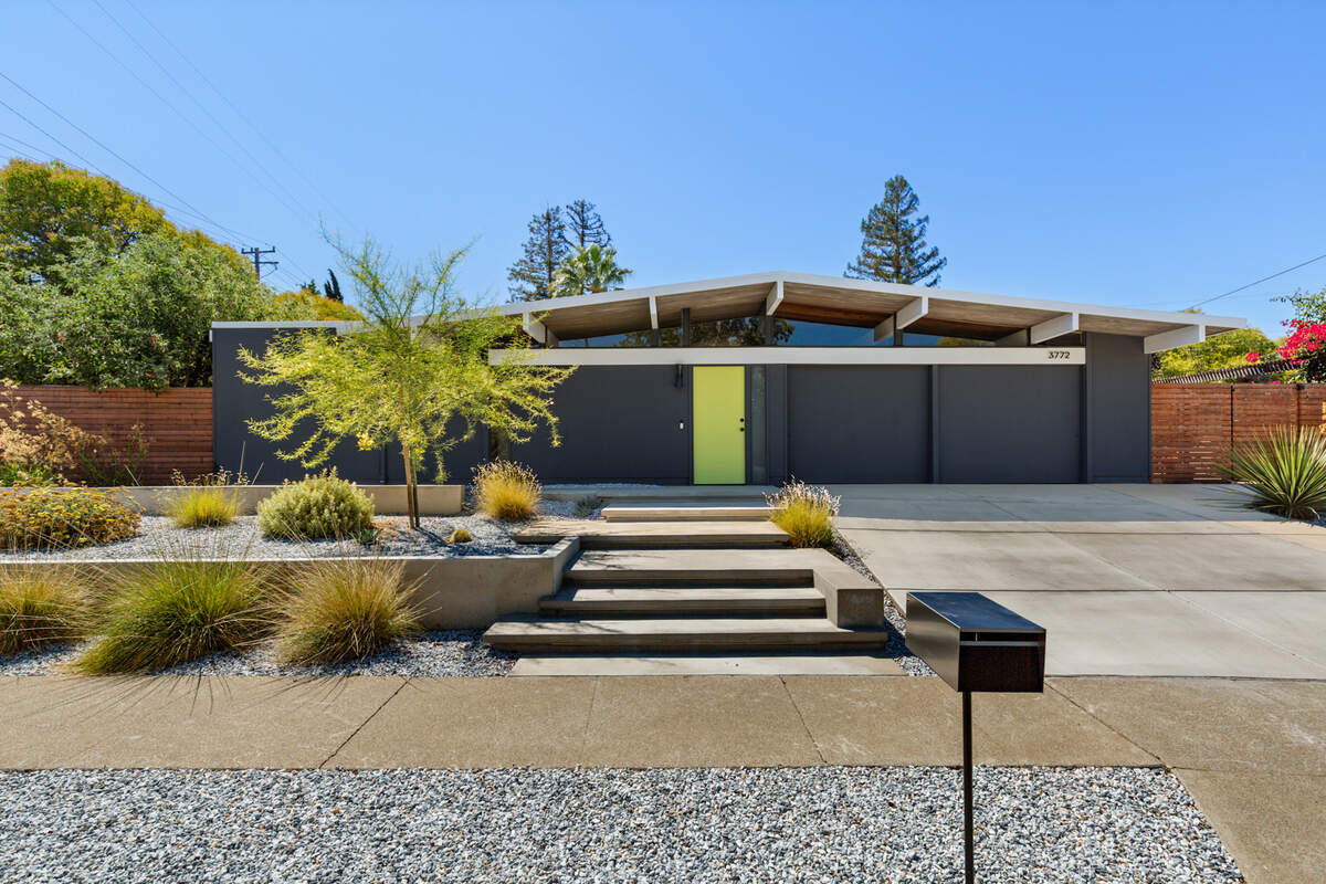 Thoughtful upgrades—including a refreshed kitchen and modern finishes—complement the home’s classic 1964 design and signature low-slung rooflines.