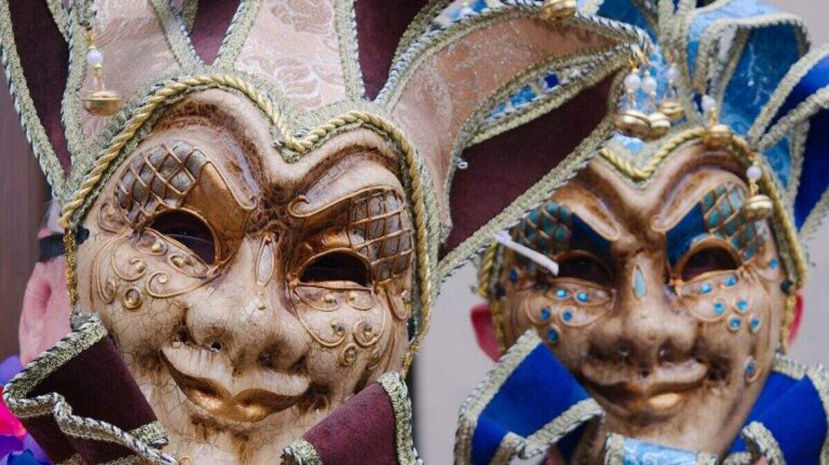 Mardi Gras revelers fill the streets of Nevada City at the 2018 parade.