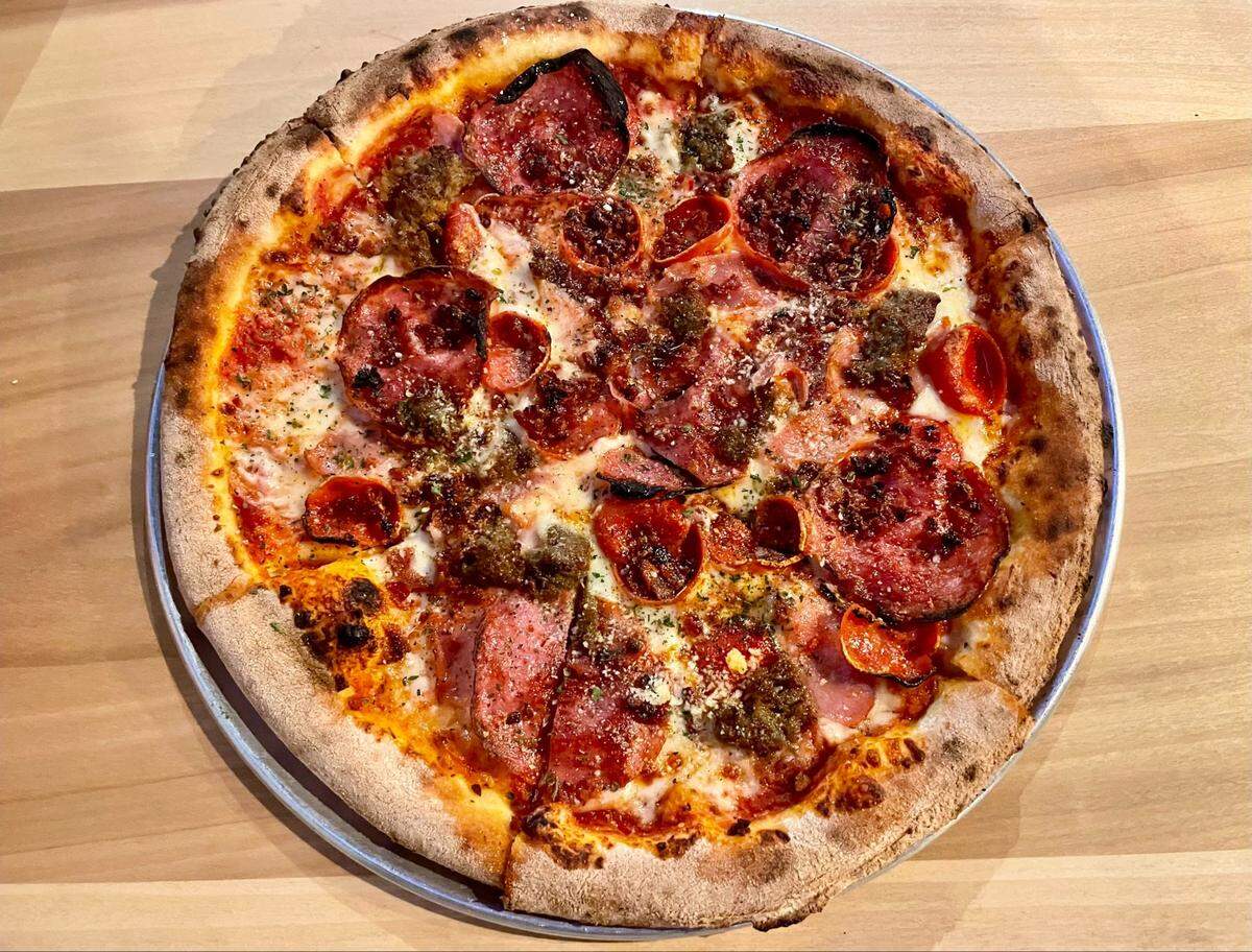 Hop Gardens’ Uncle Pete pizza includes meatball crumbles, pepperoni, salami, mortadella and bacon.